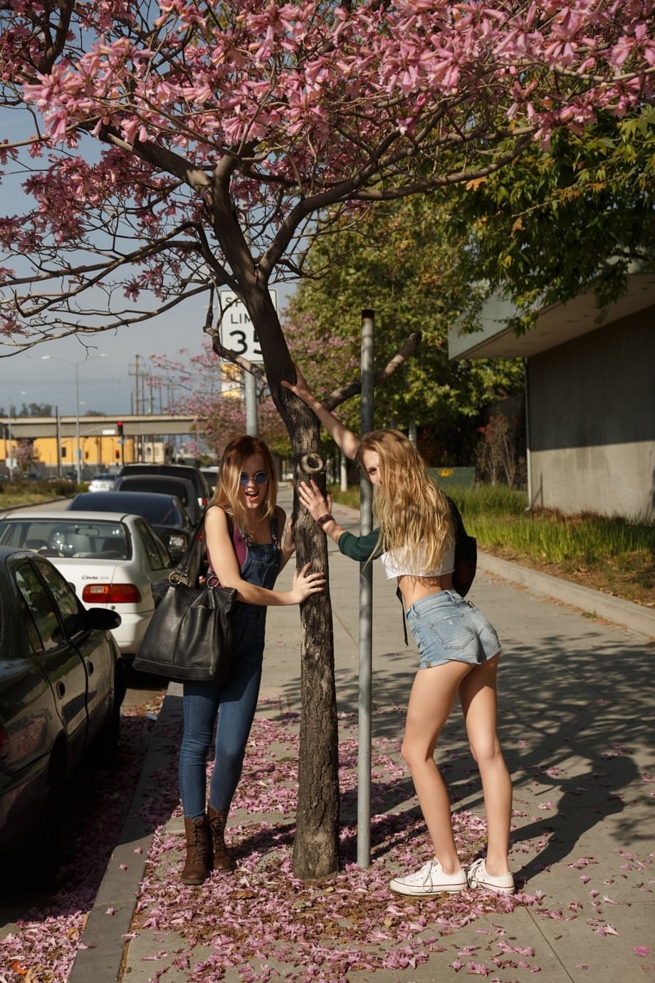 Teenage vixens Riley Anne & Winter Bliss flash their hot booties in public